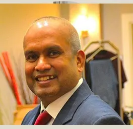 Duleepa Perera in a blue coat