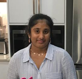 Yeheni Hetiiyakanda in a striped shirt