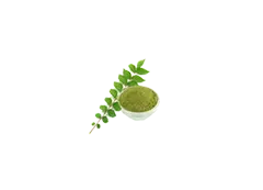 Curry leaves and grinded curry leaves in a bowl